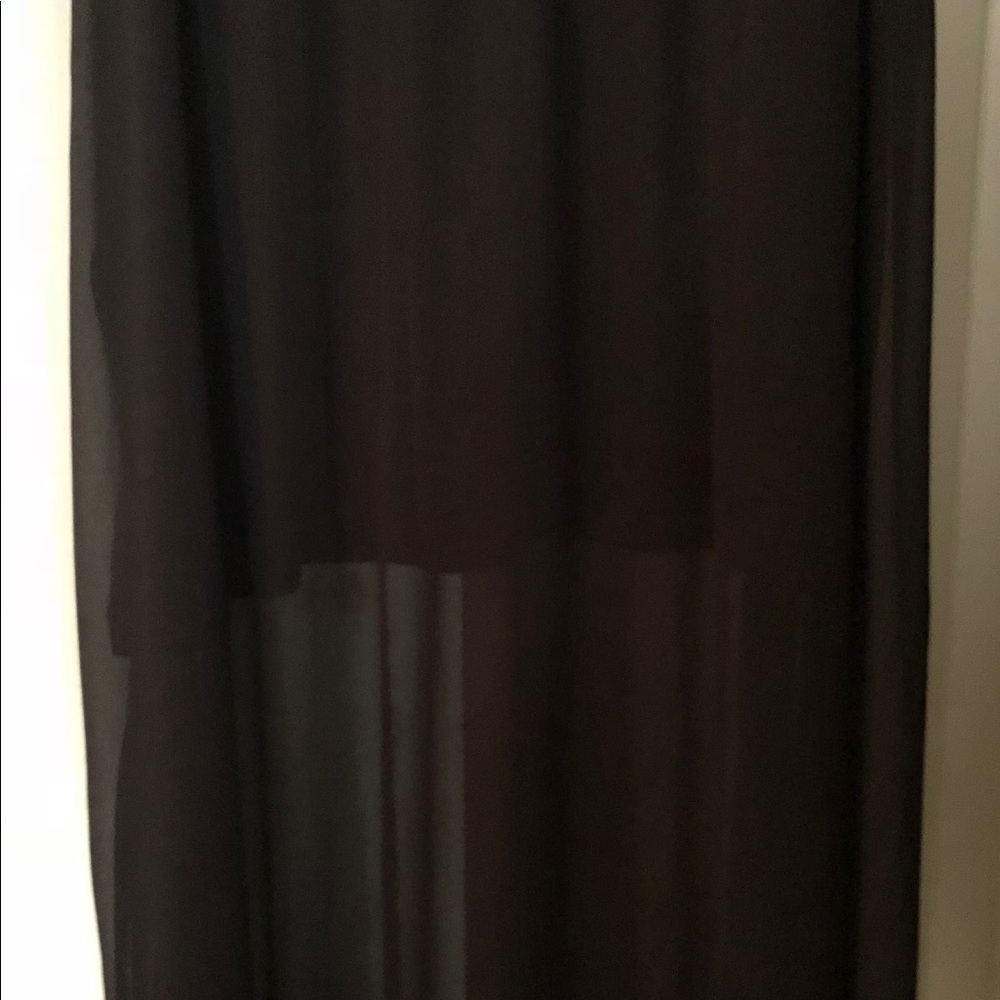 Black skirt with slits and sheer overlay